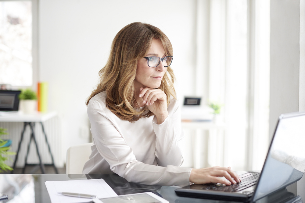 Lady looking at laptop