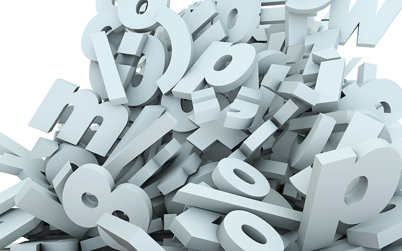 A pile of three dimensional letters and numbers.