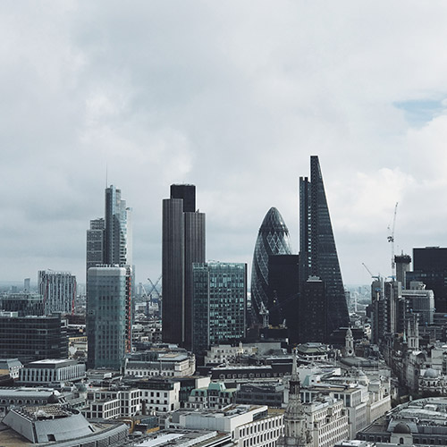 what-is-an-independent-financial-adviser-500x500 A skyline view of London, with a cloudy sky behind.