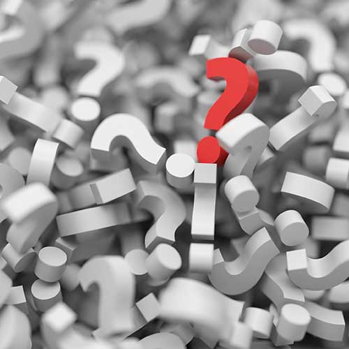 Hundreds of white question marks, one stands out in bright red.