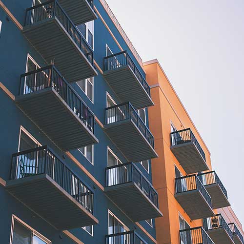 help-to-buy-transfer-800x500 A blue and orange block of apartments