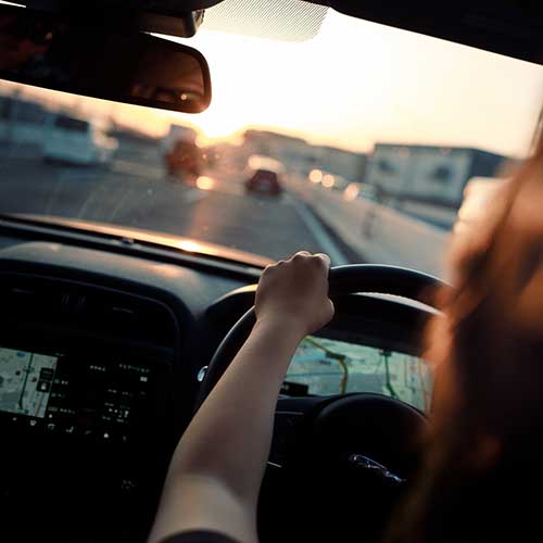 A teenager learning to drive