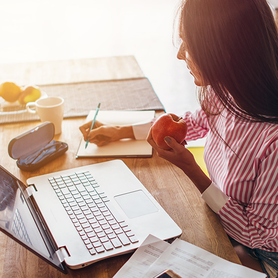 Young woman at home planning family budget and finances.