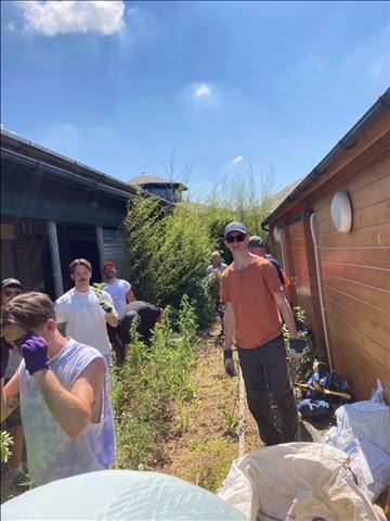 Tom Ryan Matt Louis Ben Jason between sheds tidying up Tom Ryan Matt Louis Ben Jason between sheds tidying up
