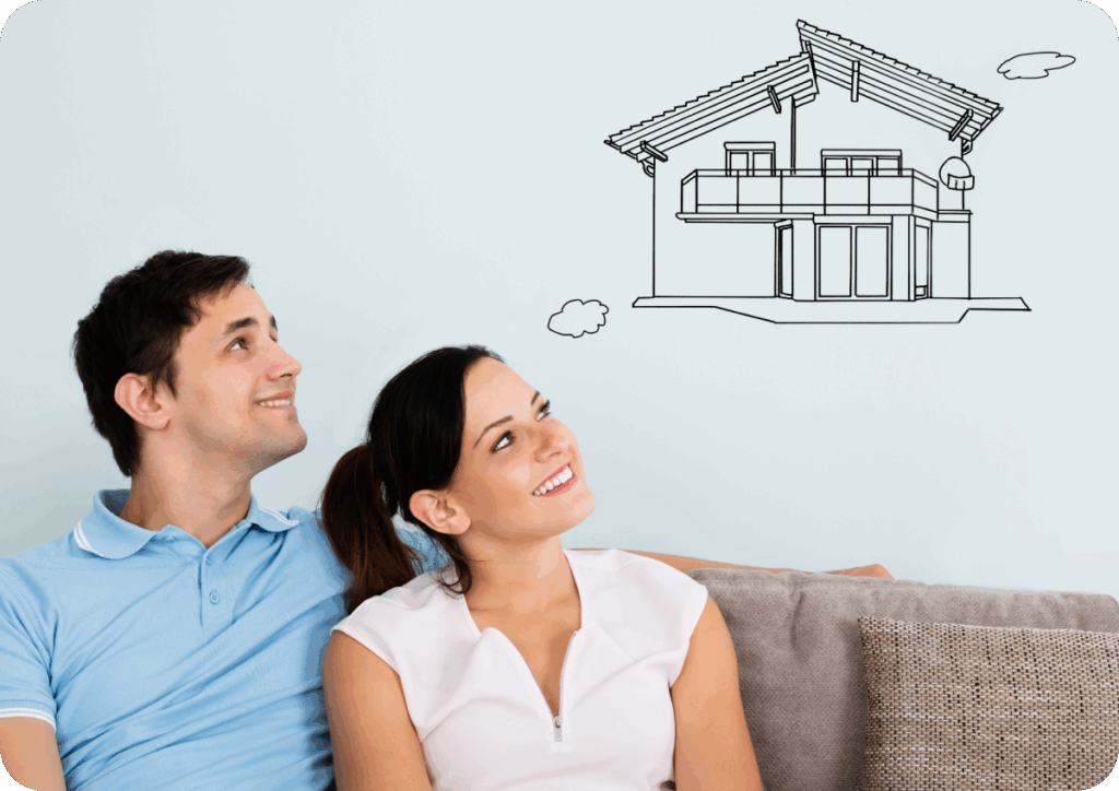 Two people sitting on a couch looking thinking about their new home