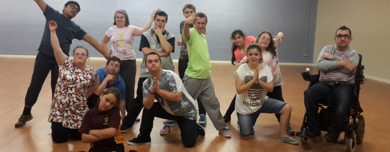 Dance school members strike a pose